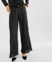 Pantalon large et fluide en maille plissée et pailletée femme